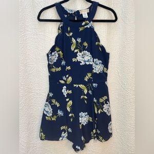 Altar’d State high-neck scalloped navy floral romper. Size L.